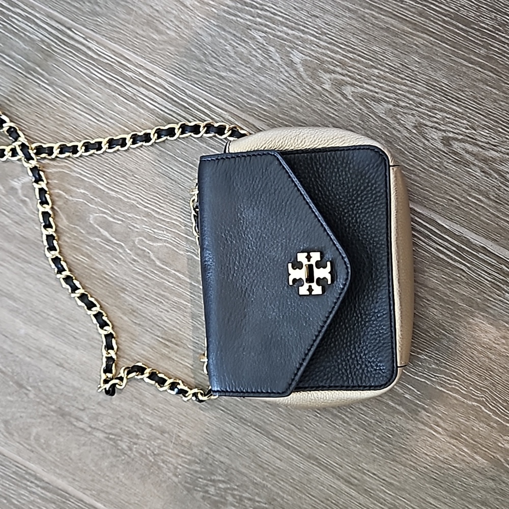 Black and gold tory burch purse